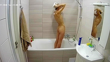 The hidden cam caught sister naked in the tub while trying to get cleaner