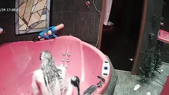 A camera on the top of the room caught sister naked going crazy while wet