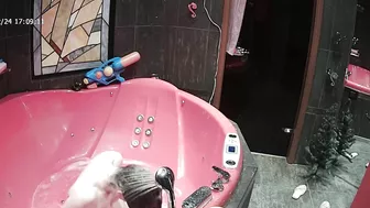 A camera on the top of the room caught sister naked going crazy while wet