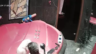 A camera on the top of the room caught sister naked going crazy while wet