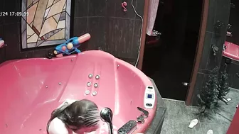 A camera on the top of the room caught sister naked going crazy while wet