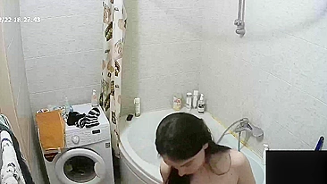 Hidden cam caught sister in the bathroom standing in the tub and looking hot