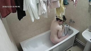 Friend caught sister removing her clothes before getting into the bathtub