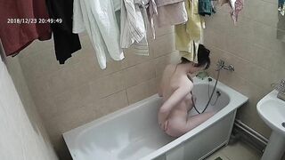 Friend caught sister removing her clothes before getting into the bathtub