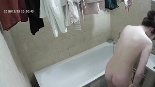 Friend caught sister removing her clothes before getting into the bathtub