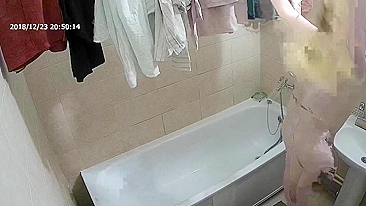Friend caught sister removing her clothes before getting into the bathtub