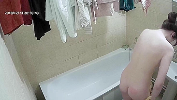 Friend caught sister removing her clothes before getting into the bathtub