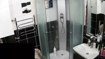 Hidden camera in the bathroom leads to a caught sister being naked and sexy