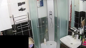Hidden camera in the bathroom leads to a caught sister being naked and sexy