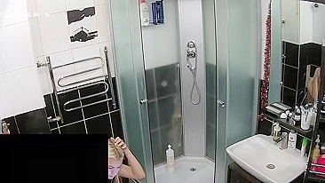 Hidden camera in the bathroom leads to a caught sister being naked and sexy