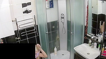 Hidden camera in the bathroom leads to a caught sister being naked and sexy