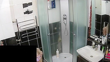 Hidden camera in the bathroom leads to a caught sister being naked and sexy