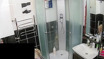 Hidden camera in the bathroom leads to a caught sister being naked and sexy
