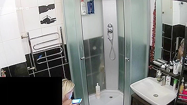 Hidden camera in the bathroom leads to a caught sister being naked and sexy