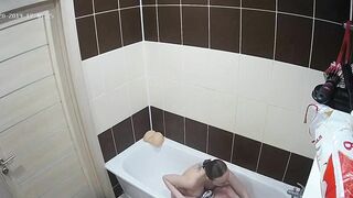 High definition camera caught sister having a bath and showing her big boobs