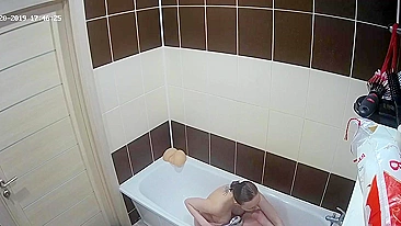 High definition camera caught sister having a bath and showing her big boobs