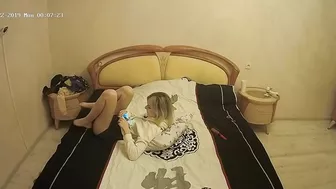 The camera in the bedroom caught sister looking at porn and masturbating too