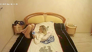 The camera in the bedroom caught sister looking at porn and masturbating too