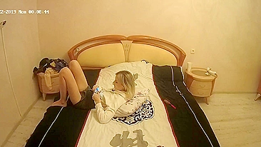 The camera in the bedroom caught sister looking at porn and masturbating too