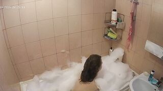 Hidden cam in the bathroom means a caught sister while getting wet in the shower