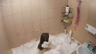 Hidden cam in the bathroom means a caught sister while getting wet in the shower