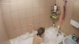 Hidden cam in the bathroom means a caught sister while getting wet in the shower