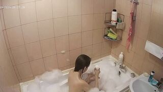 Hidden cam in the bathroom means a caught sister while getting wet in the shower