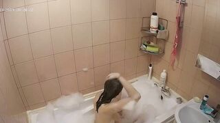 Hidden cam in the bathroom means a caught sister while getting wet in the shower