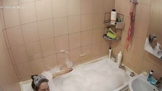 Hidden cam in the bathroom means a caught sister while getting wet in the shower