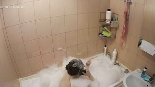 Hidden cam in the bathroom means a caught sister while getting wet in the shower