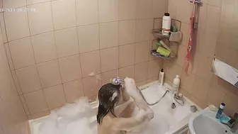 Hidden cam in the bathroom means a caught sister while getting wet in the shower