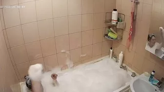 Hidden cam in the bathroom means a caught sister while getting wet in the shower