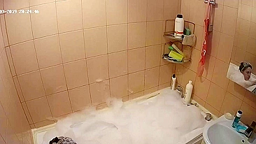 Hidden cam in the bathroom means a caught sister while getting wet in the shower