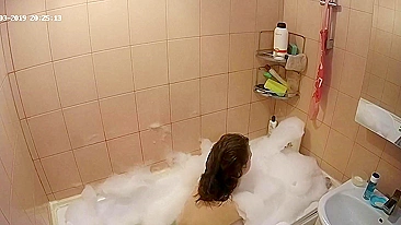 Hidden cam in the bathroom means a caught sister while getting wet in the shower