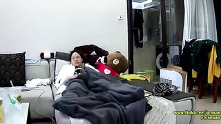 Asian caught sister is trying to hide from the hidden cam while masturbating