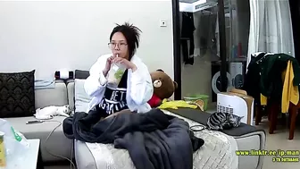 Asian caught sister is trying to hide from the hidden cam while masturbating