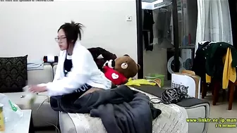 Asian caught sister is trying to hide from the hidden cam while masturbating