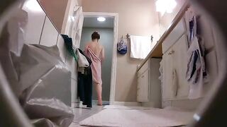 The hidden cam caught sister removing her clothes while in the bathroom