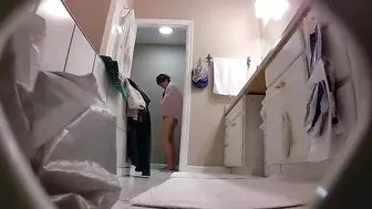 The hidden cam caught sister removing her clothes while in the bathroom