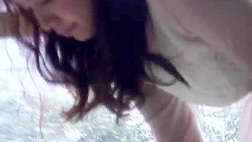 Voyeur captures stunning Japanese babe masturbating for his pleasure.