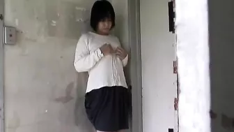 Uncensored XXX - Gorgeous Japanese girl masturbates in voyeuristic scene.