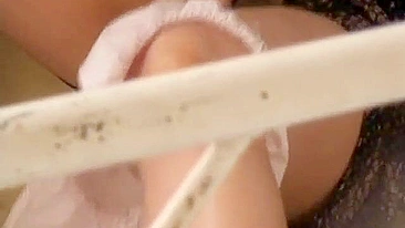Sexy Japanese neighbor masturbates, recorded by a voyeur.
