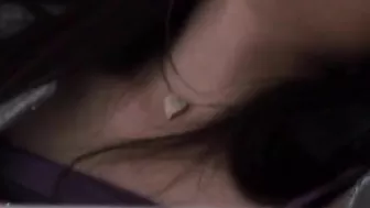 Hot Japanese babe pleasures herself while being watched by a voyeur.