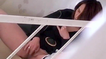 XXX Uncensored - Naughty Japanese girl masturbates for the camera.