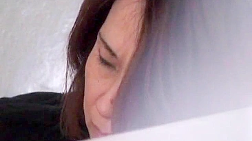 XXX Uncensored - Naughty Japanese girl masturbates for the camera.