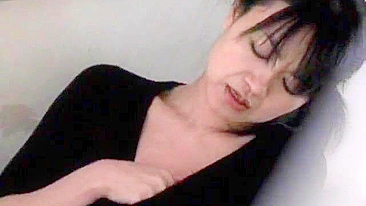 Uncensored - Hot Japanese babe pleasures herself, watched by voyeur.