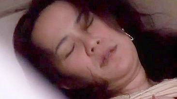 Intense passion as my naughty Japanese neighbor gets off on her own in this X-rated spectacle.