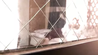 A steamy scene unfolds as my sexy neighbor plays with herself for all to see.