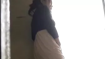 My kinky Asian neighbor pleasures herself in a voyeuristic fantasy.