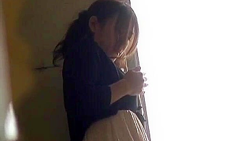 My kinky Asian neighbor pleasures herself in a voyeuristic fantasy.